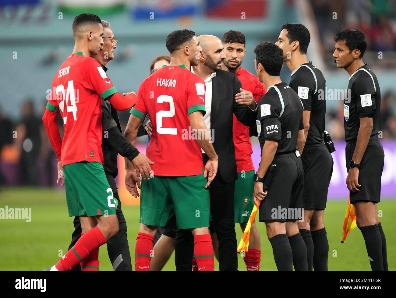 DOHA, QATAR - DECEMBER 17: Walid Regragui head coach of Morocco and Players of Morocco Badr Benoun,Achraf Hakimi argues with the Referee Abdulrahman Al-Jassim ,during the FIFA World Cup Qatar 2022 3rd Place match between Croatia and Morocco at Khalifa International Stadium on December 17, 2022 in Doha, Qatar. (Photo by MB Media) Stock Photo