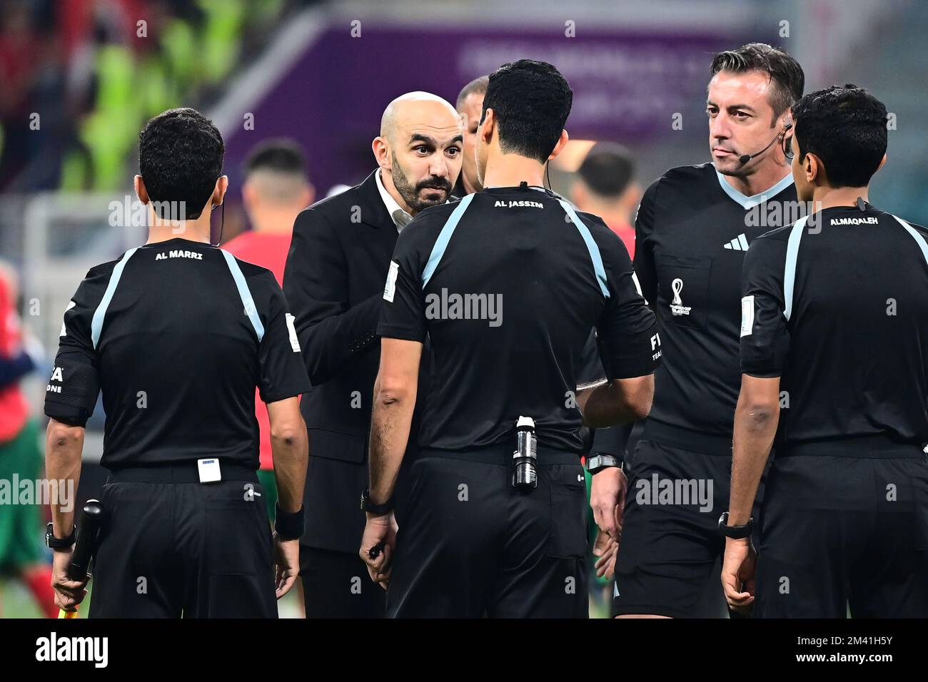 DOHA, QATAR - DECEMBER 17: Walid Regragui head coach of Morocco argues with the Referee Abdulrahman Al-Jassim ,during the FIFA World Cup Qatar 2022 3rd Place match between Croatia and Morocco at Khalifa International Stadium on December 17, 2022 in Doha, Qatar. (Photo by MB Media) Stock Photo