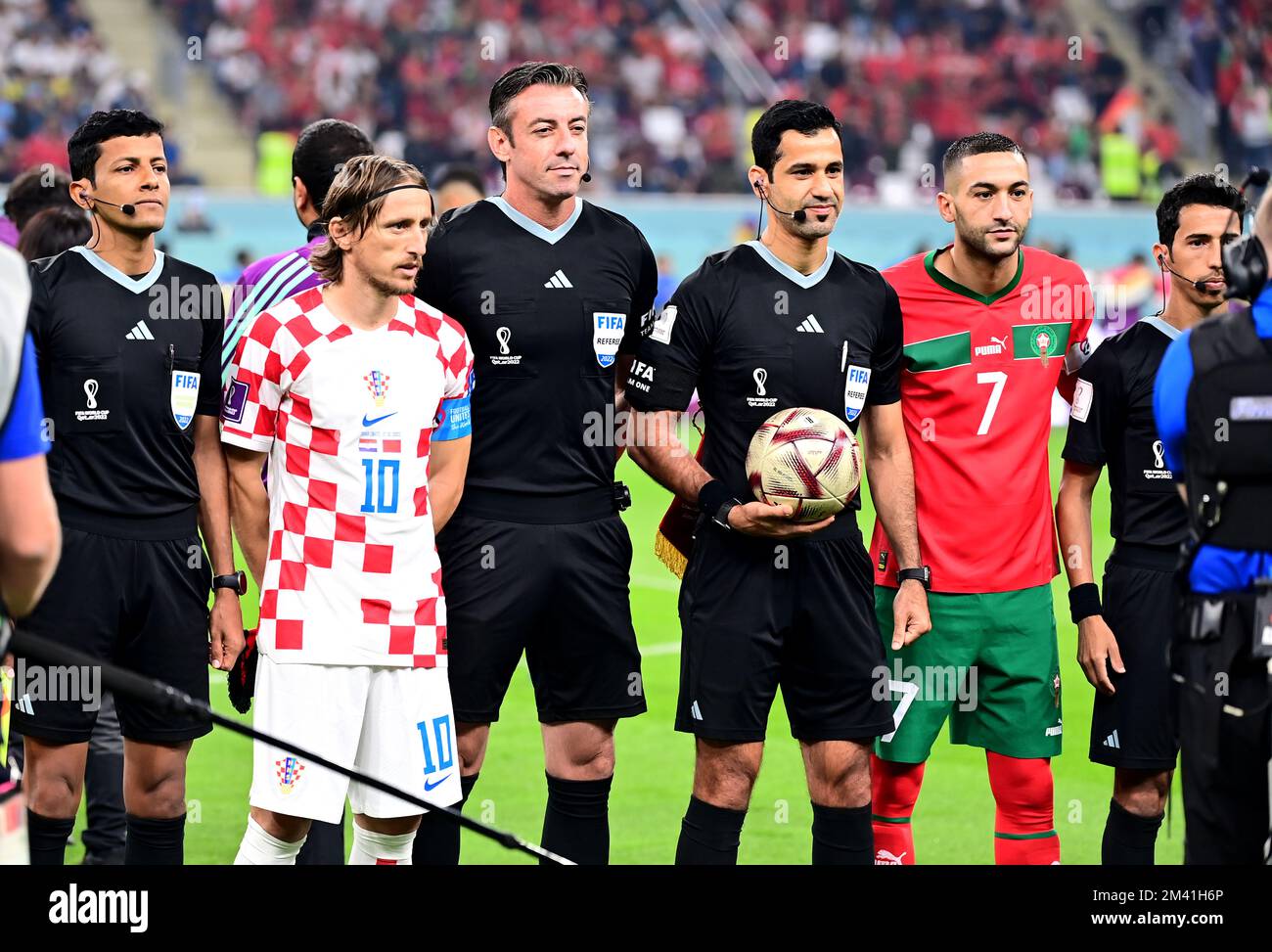 DOHA, QATAR - DECEMBER 17: The Captain of Croatia Luka Modric and Morocco Hakim Ziyech with the Referee Abdulrahman Al-Jassim and his assistent ,prior the FIFA World Cup Qatar 2022 3rd Place match between Croatia and Morocco at Khalifa International Stadium on December 17, 2022 in Doha, Qatar. (Photo by MB Media) Stock Photo