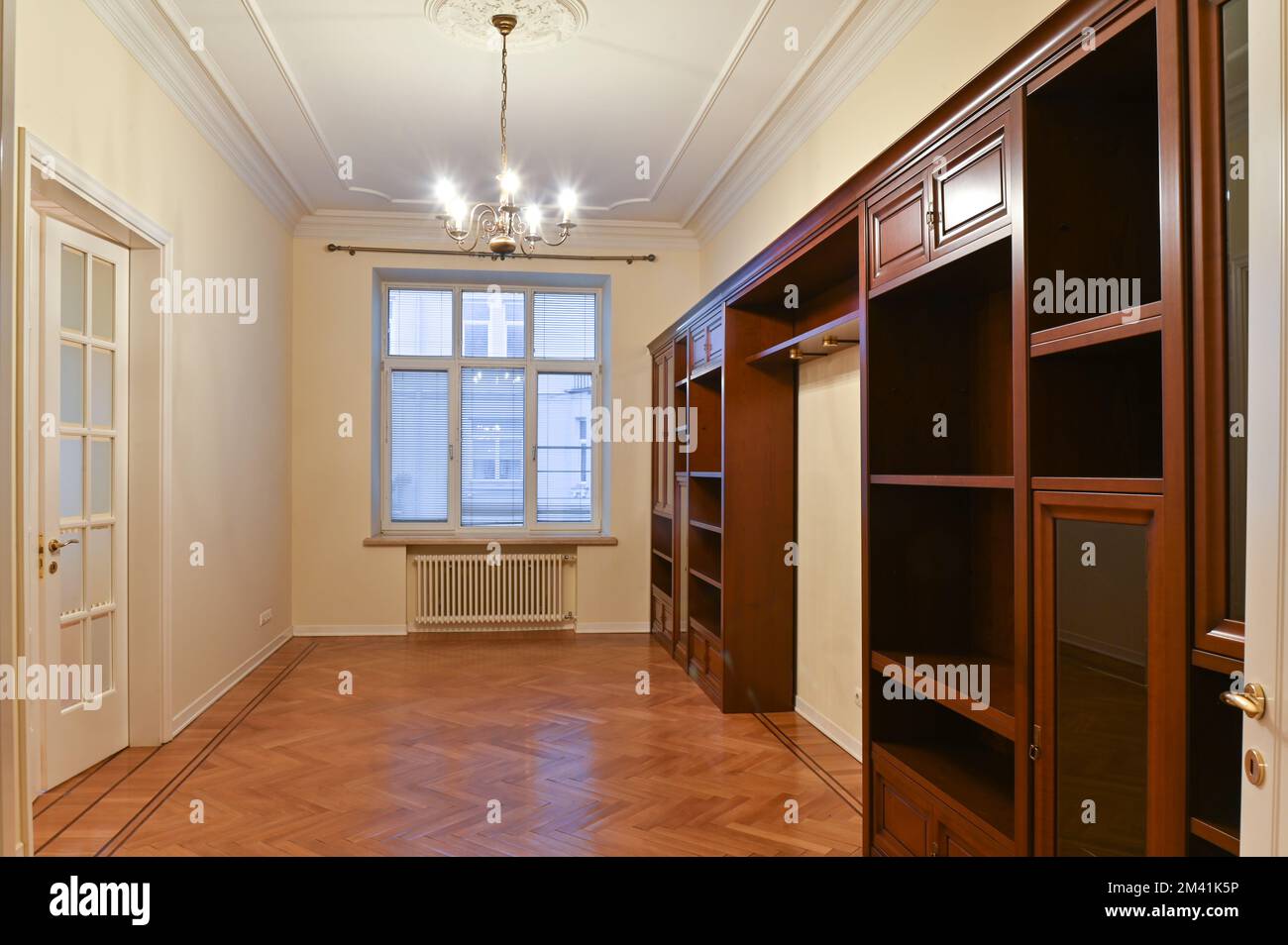 An empty room with a large window, rent, sale and furniture made of ...