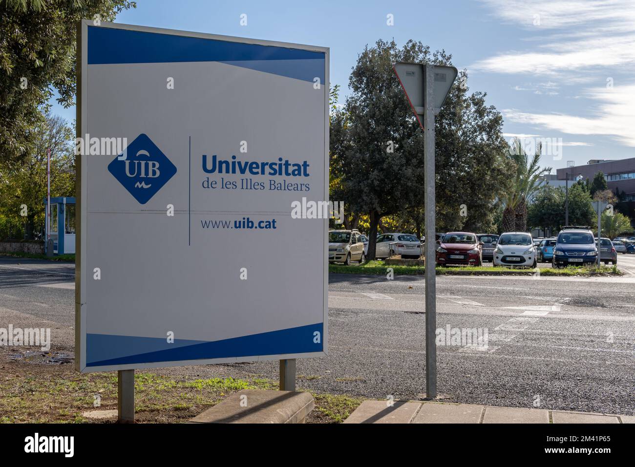 Palma de Mallorca, Spain; december 15 2022: Blue poster with white letters of the University of the Balearic Islands, Uib, a sunny morning. Island of Stock Photo