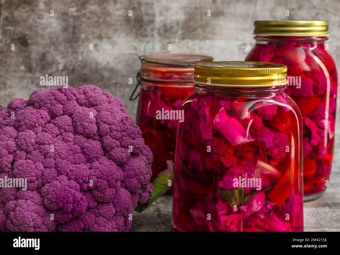 Homemade pickle with purple cauliflower in jars on a gray background Stock Photo Alamy
