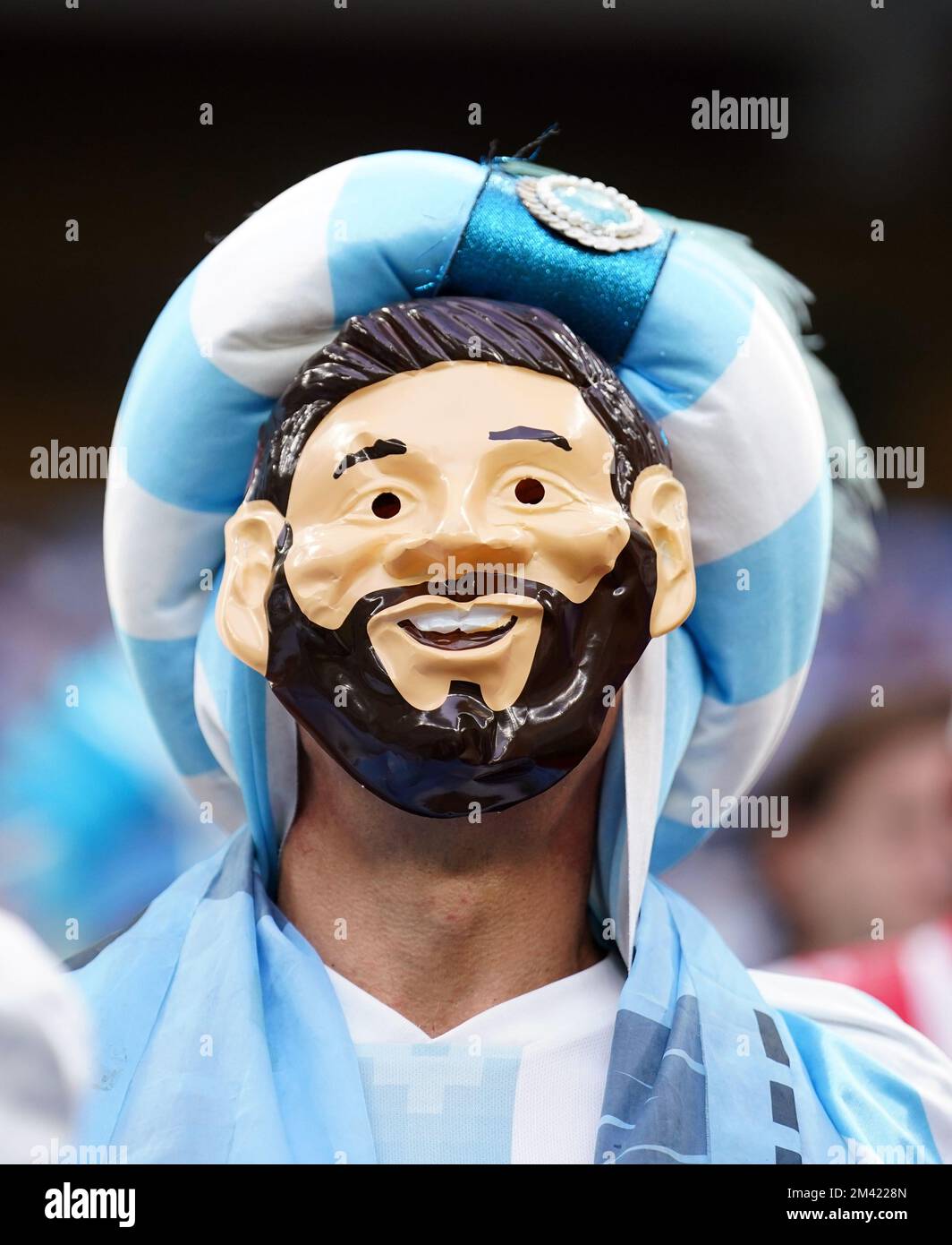 An Argentina fan sports a Lionel Messi face mask ahead of the FIFA World  Cup final at Lusail Stadium, Qatar. Picture date: Sunday December 18, 2022  Stock Photo - Alamy