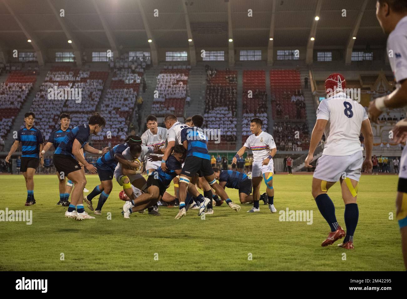 Bangkok, Thailand. 17th Dec, 2022. The Traditional Rugby Match, Win the 28th His Majesty King Maha Vajiralongkorn Bodindradebayavarangkun Cup, between King's College under the royal patronage, under the royal patronage (white jerseys) vs Vajiravudh College (blue jerseys), on Saturday 17 December 2022, at Supachalasai Stadium, Bangkok. King's College under the royal patronage beat Vajiravudh College 42-15 points. (Credit Image: © Teera Noisakran/Pacific Press via ZUMA Press Wire) Stock Photo