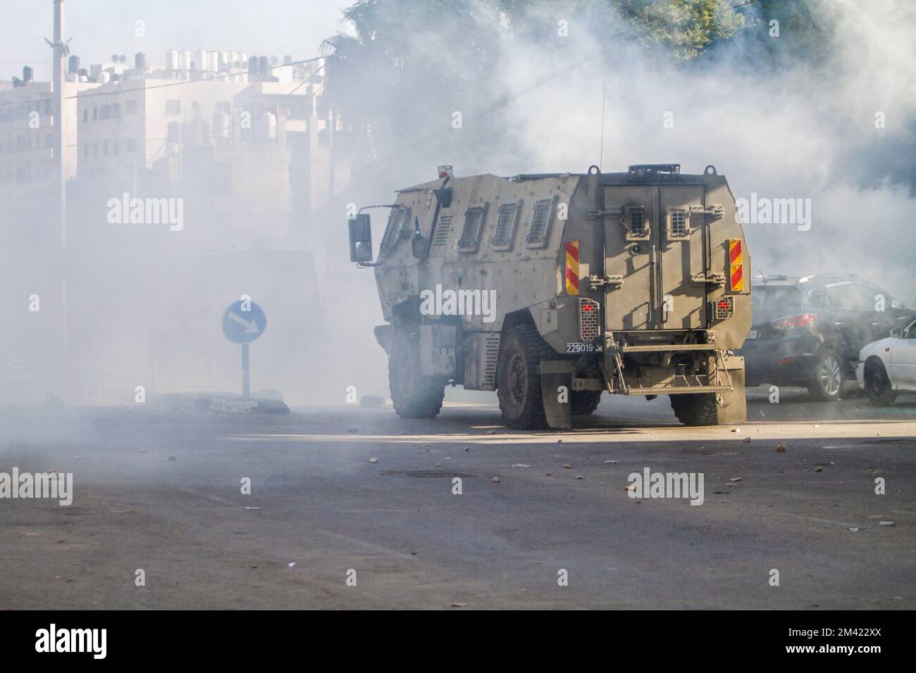 Nablus, Palestine. 18th Dec, 2022. Israeli army forces fire tear gas ...