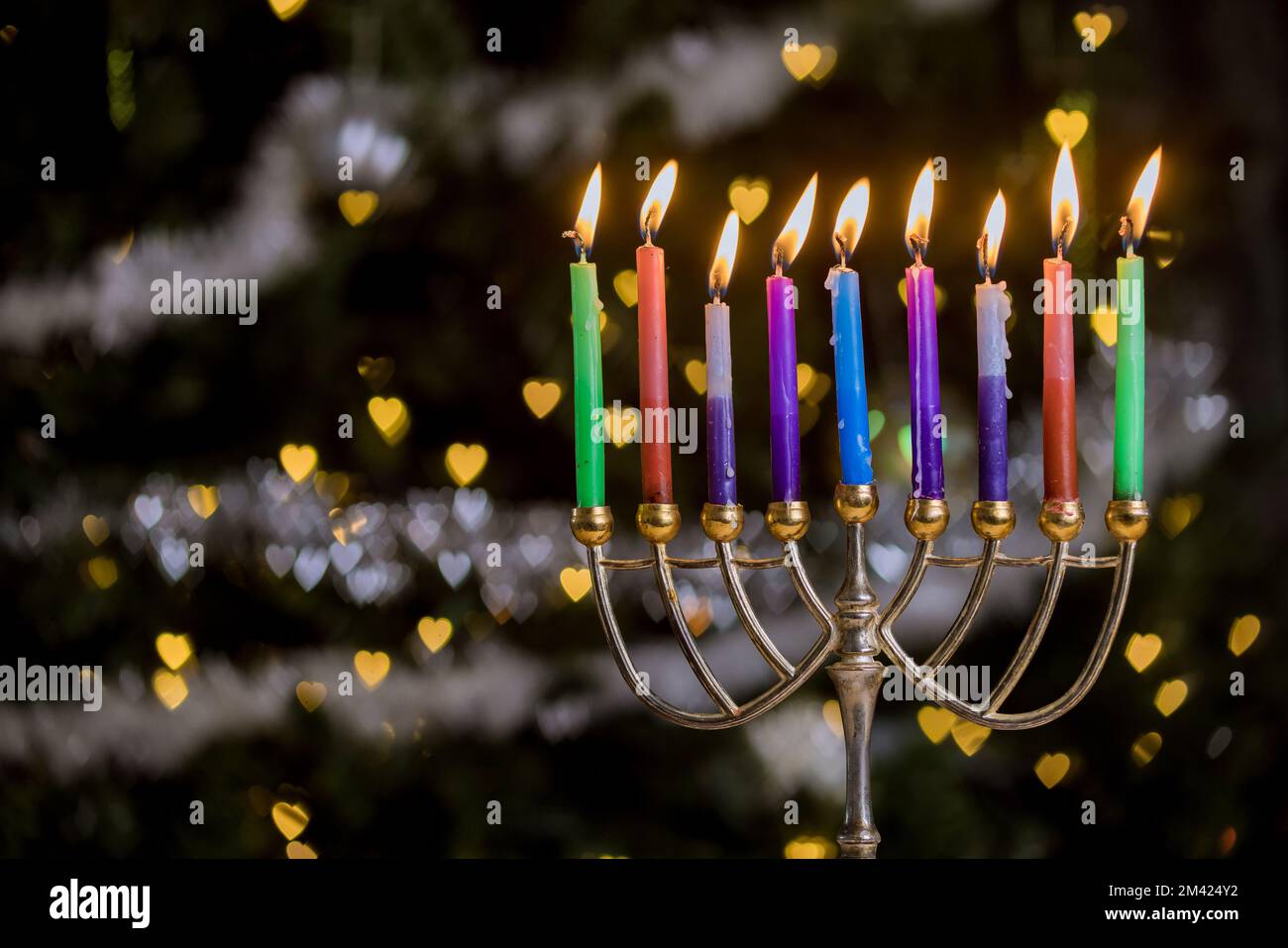 Jewish culture holiday symbol, candles are lit on Hanukkiah Menorah to