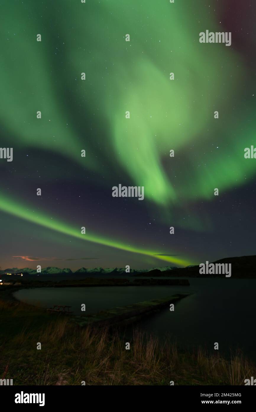 Northern lights above Seglvik, Troms, Norway with stars Stock Photo
