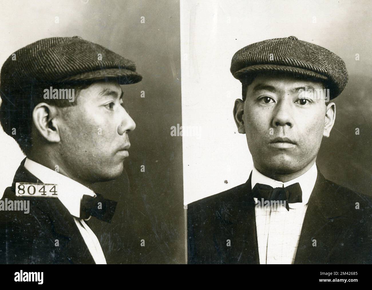 Photograph of Tom Akiyama. This item is the prison photograph, also known as the 'mug shot,' of Leavenworth inmate Tom Akiyama register number 8044. Bureau of Prisons, Inmate case files. Stock Photo