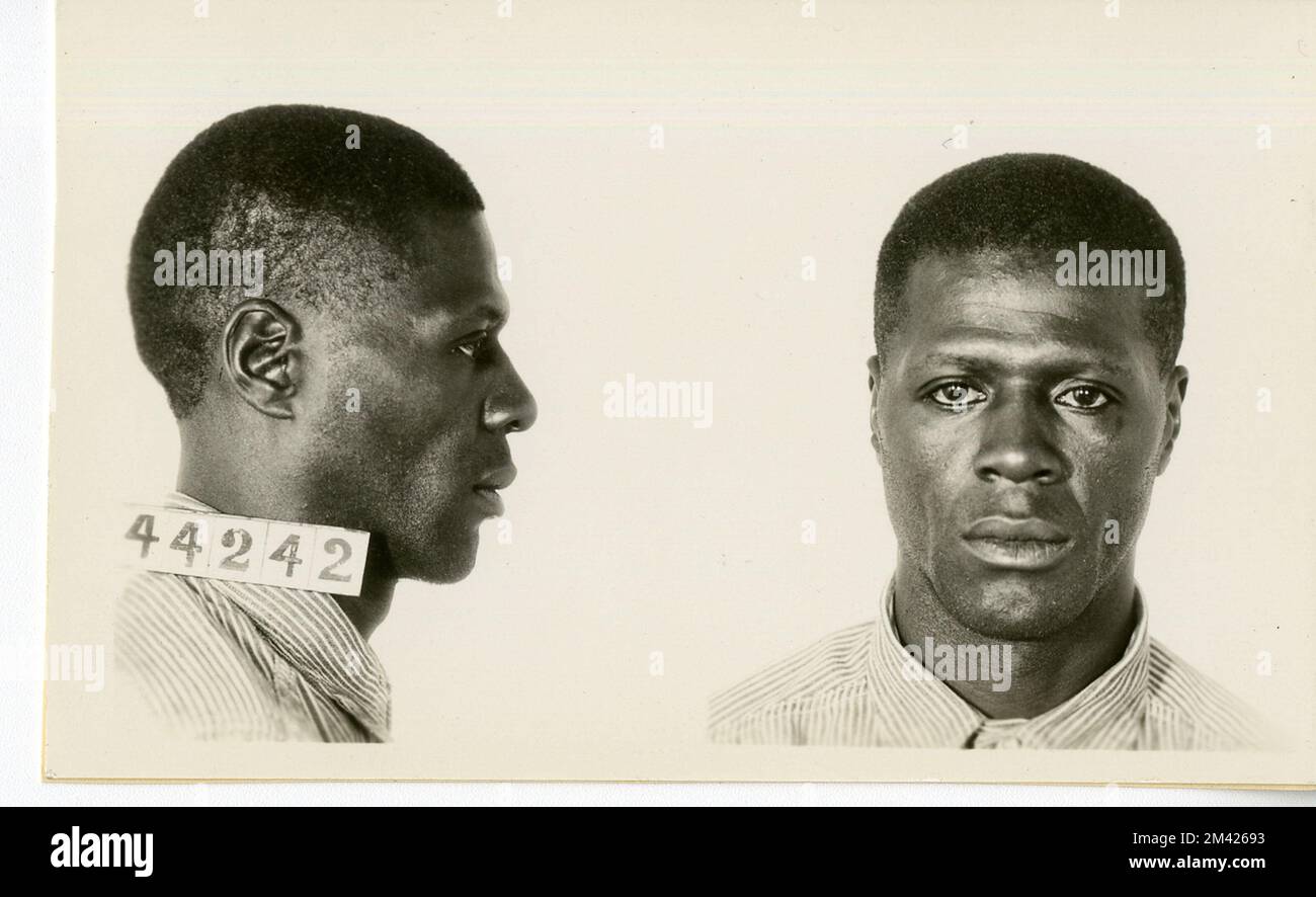 Photograph of Ernest Baker. This item is the prison photograph, also known as the 'mug shot,' of Leavenworth inmate Ernest Baker register number 44242. Bureau of Prisons, Inmate case files. Stock Photo