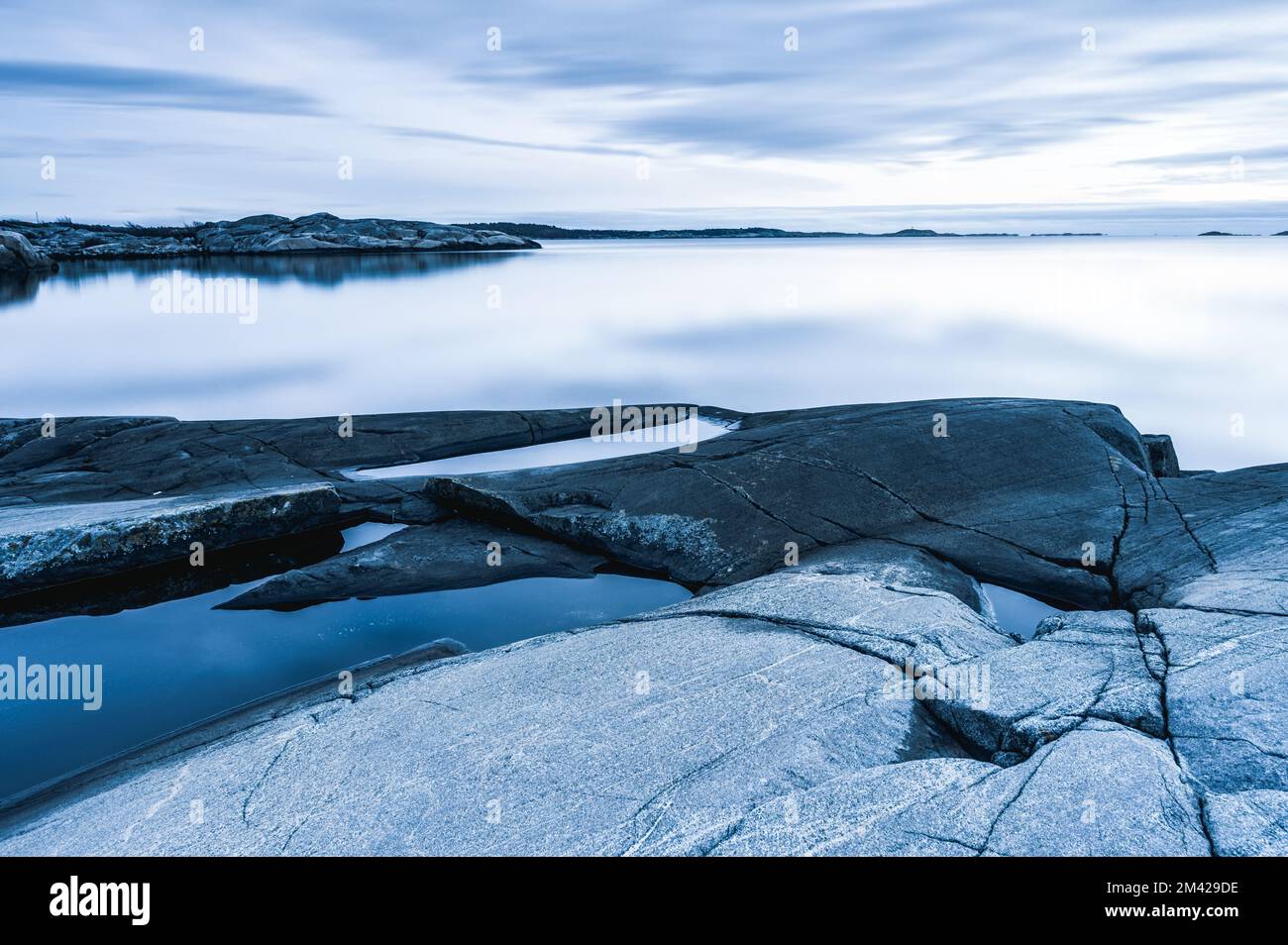 Coastal landscape with still water, Sweden. Stock Photo
