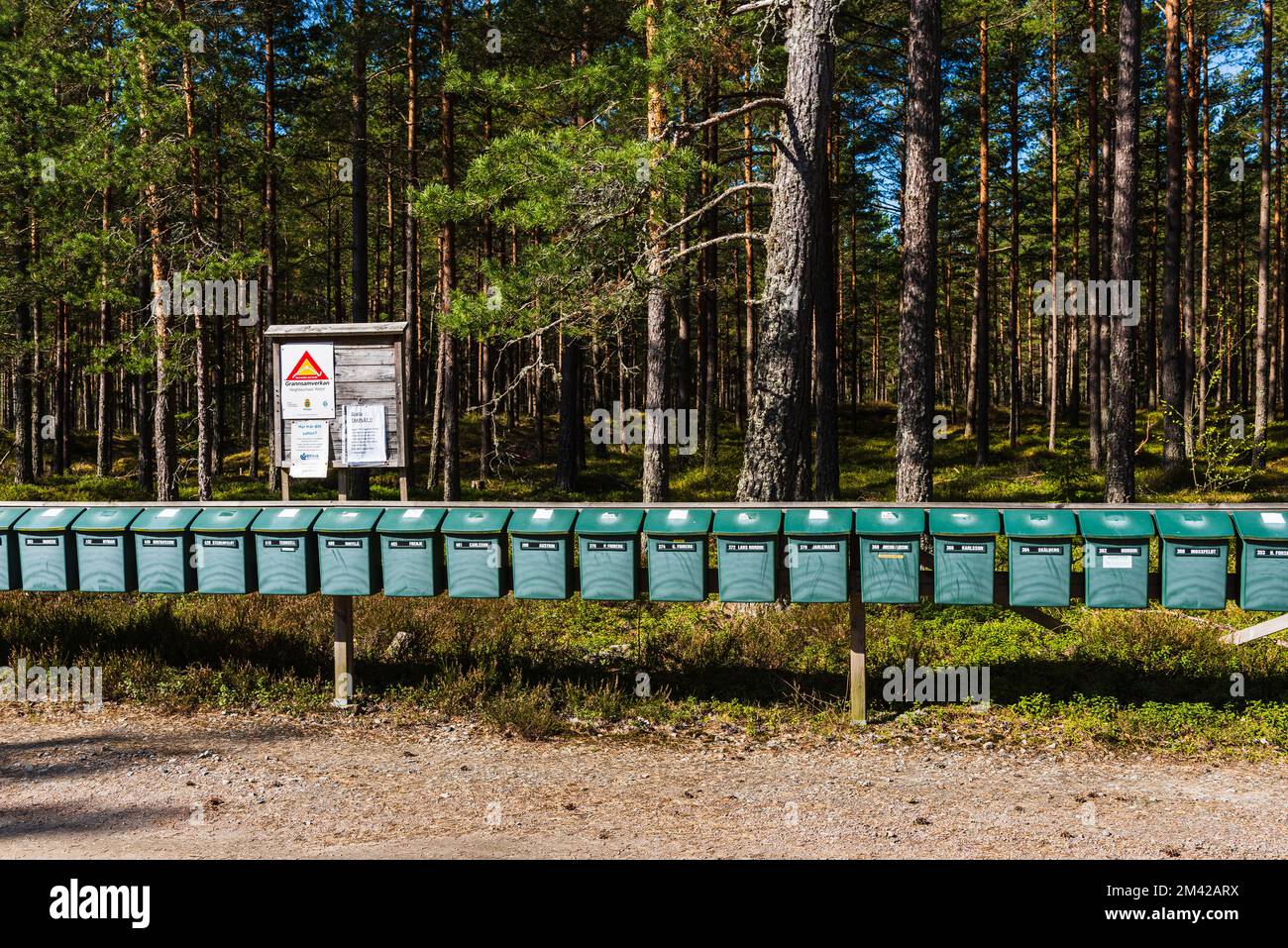 Row of green mailboxes Stock Photo Alamy