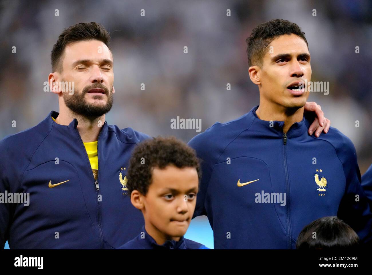 France goalkeeper Hugo Lloris (left) and Raphael Varane during their national anthem ahead of the FIFA World Cup final at Lusail Stadium, Qatar. Picture date: Sunday December 18, 2022. Stock Photo