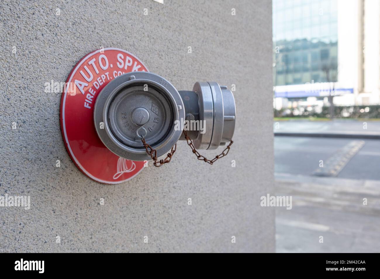 Standpipe on wall. Fire water outlet. Stock Photo