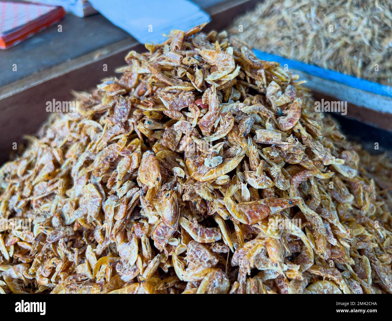 A closeup of small dried fish in an Asian market Stock Photo - Alamy