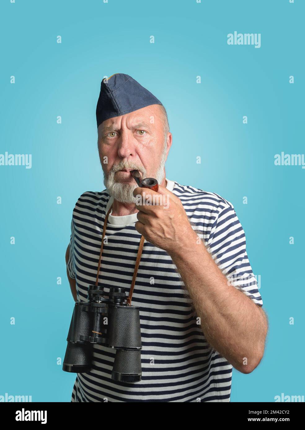Old sailor smoking a pipe hi-res stock photography and images - Alamy