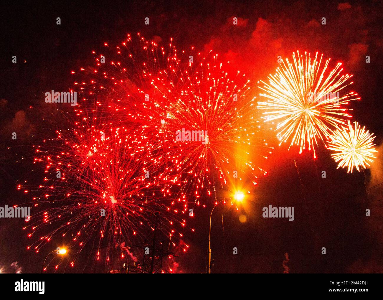 brigh tmulti-colored fireworks in the night sky Stock Photo