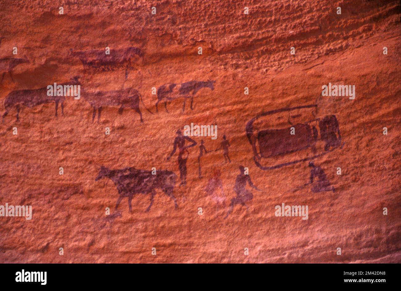 Neolithic rock painting from the pastoral period at the site of Sefar, Tassili N'Ajjer, South Algeria, Sahara desert. Stock Photo