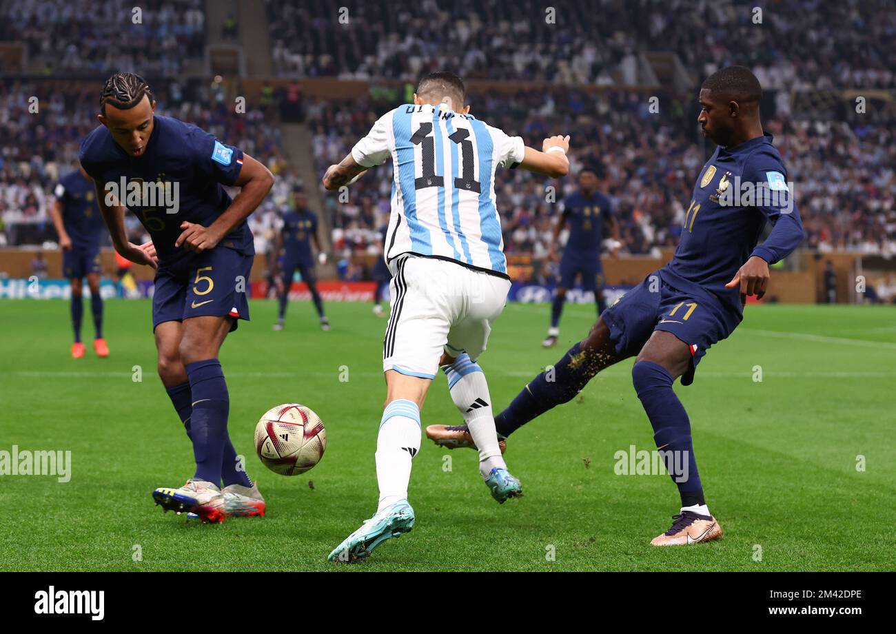 Doha, Qatar, 18th December 2022.  Angel Di Maria of Argentina finds space between Jules Kounde and Ousmane Dembele of France during the FIFA World Cup 2022 match at Lusail Stadium, Doha. Picture credit should read: David Klein / Sportimage Credit: Sportimage/Alamy Live News/Alamy Live News/Alamy Live News Credit: Sportimage/Alamy Live News Stock Photo