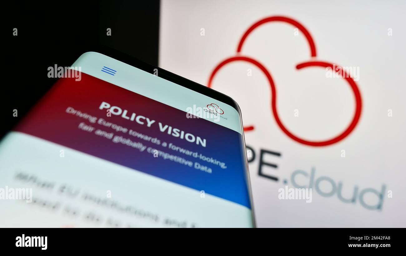 Mobile phone with website of cloud providers trade association CISPE on screen in front of business logo. Focus on top-left of phone display. Stock Photo