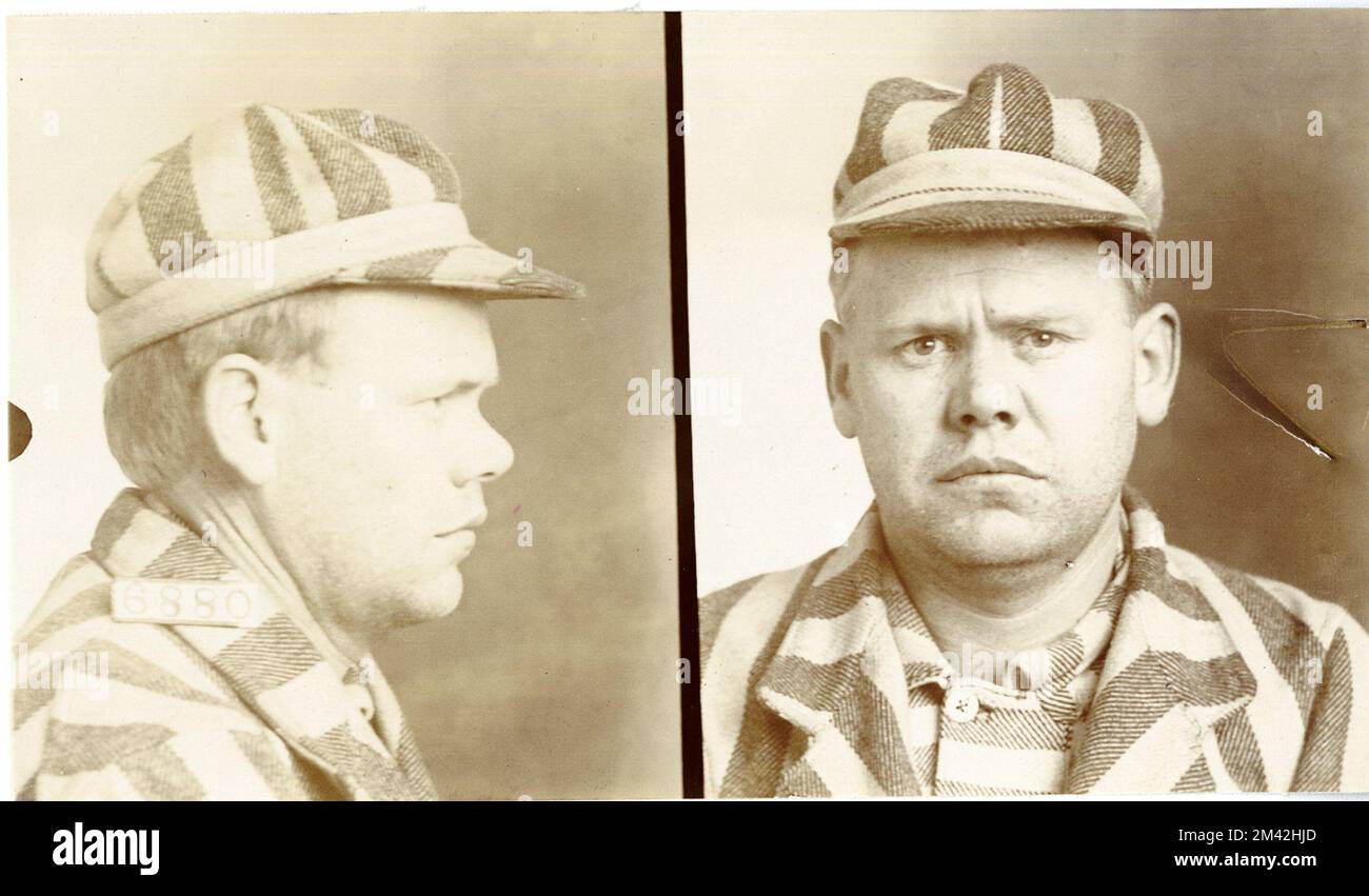 . This item is the prison photograph, also known as the 'mug shot,' of Leavenworth inmate David Belmont, register number 6880. Bureau of Prisons, Inmate case files. Stock Photo
