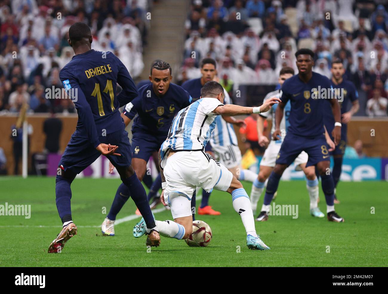 Doha, Qatar, 18th December 2022.  Ousmane Dembele of France brings down Angel Di Maria of Argentina to give a way a penalty during the FIFA World Cup 2022 match at Lusail Stadium, Doha. Picture credit should read: David Klein / Sportimage/Alamy Live News Credit: Sportimage/Alamy Live News Stock Photo