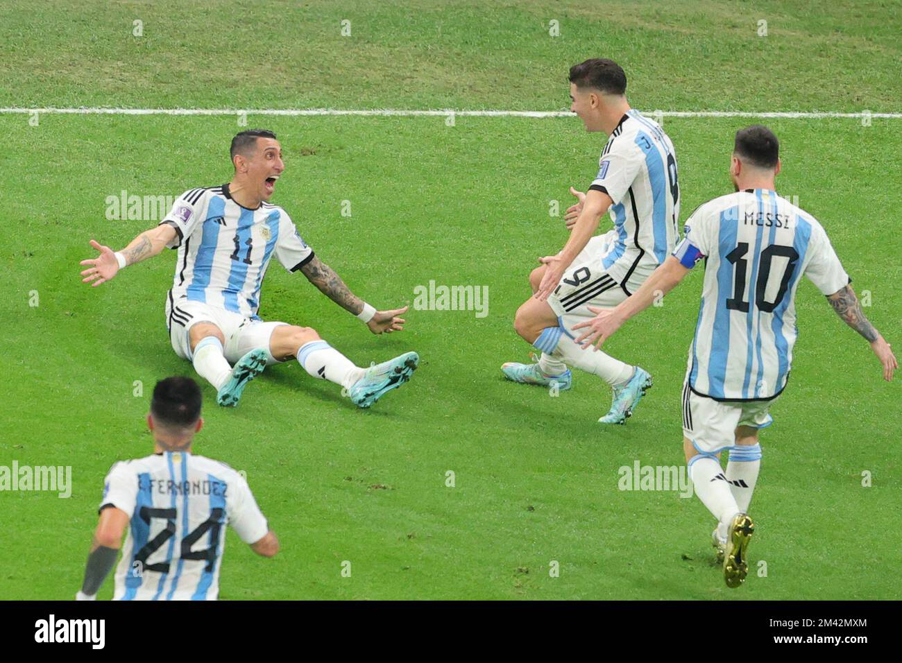 Lusail, Qatar. 18th Dec, 2022. Angel Di Maria of Argentina celebrates scoring ArgentinaÕs second goal with team mates during the Final of the FIFA World Cup Qatar 2022 between Argentina and France at Lusail Stadium, Lusail, Qatar on 18 December 2022. Photo by Peter Dovgan. Editorial use only, license required for commercial use. No use in betting, games or a single club/league/player publications. Credit: UK Sports Pics Ltd/Alamy Live News Stock Photo