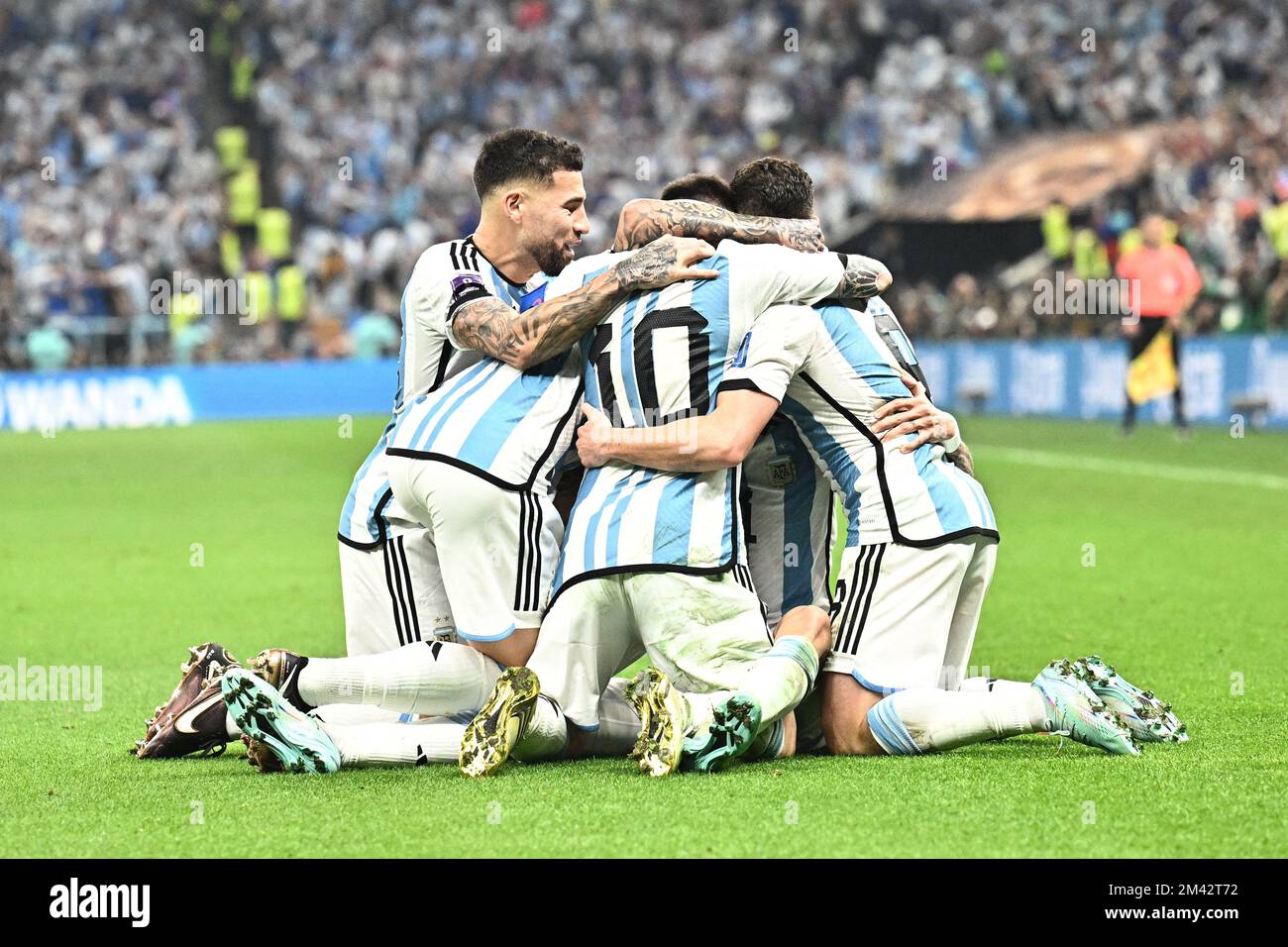 Doha, Qatar on December 18, 2022. Enzo Fernandez of Argentina, Cristian Romero of Argentina, Lionel Messi of Argentina, Rodrigo De Paul of Argentina, Julian Alvarez of Argentina, Angel Di Maria of Argentina celebrate after scoring the team's second goal during the FIFA World Cup Qatar 2022 Final match between Argentina and France at Lusail Stadium on December 18, 2022 in Lusail City, Qatar. Photo by David Niviere/ABACAPRESS.COM Credit: Abaca Press/Alamy Live News Stock Photo