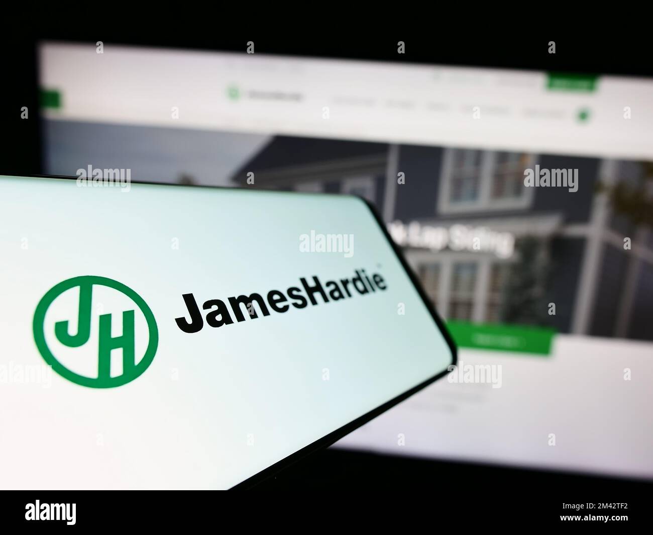 Mobile phone with logo of Irish company James Hardie Industries plc on
