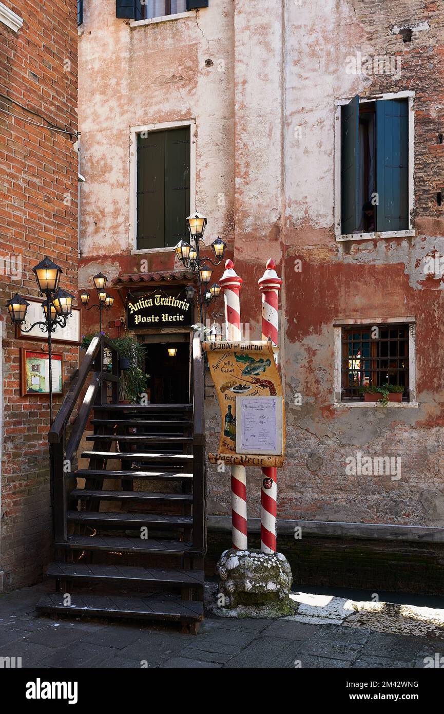 View of the romantic restaurant in the city of Venice, Italy Stock Photo