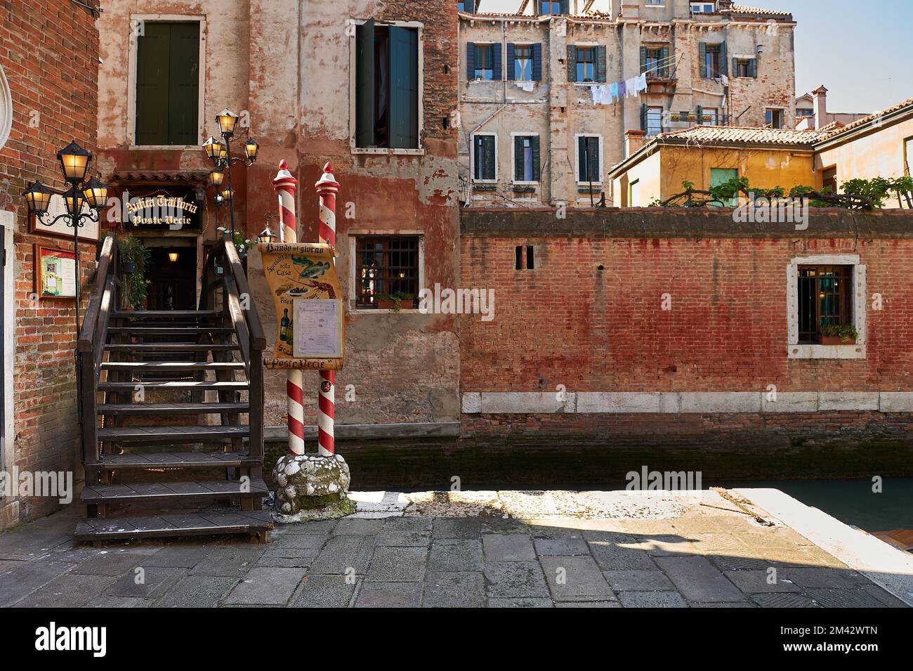 View of the romantic restaurant in the city of Venice, Italy Stock Photo