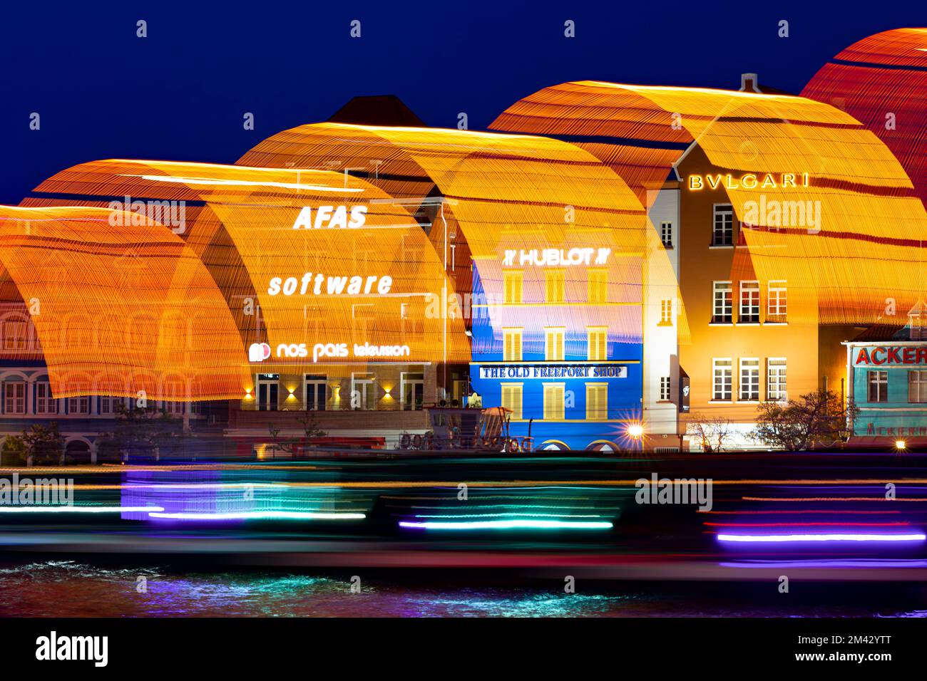 Punda waterfront of downtown Willemstad, Curacao. Light trails from