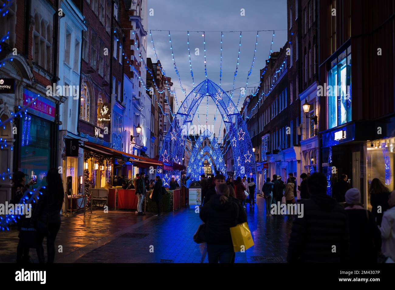 London, UK - November 6, 2022: London Oxford street in Christmas lights at night. Stock Photo