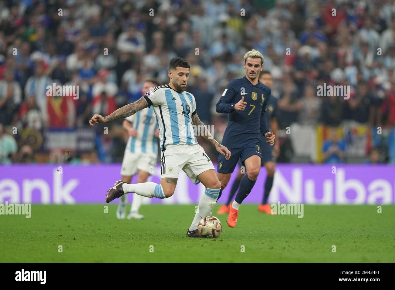 LUSAIL, QATAR - DECEMBER 18: Player of Argentina Cristian Romero controls the ball during the FIFA World Cup Qatar 2022 Final match between Argentina and France at Lusail Stadium on December 18, 2022 in Lusail, Qatar. (Photo by Florencia Tan Jun/PxImages) Stock Photo