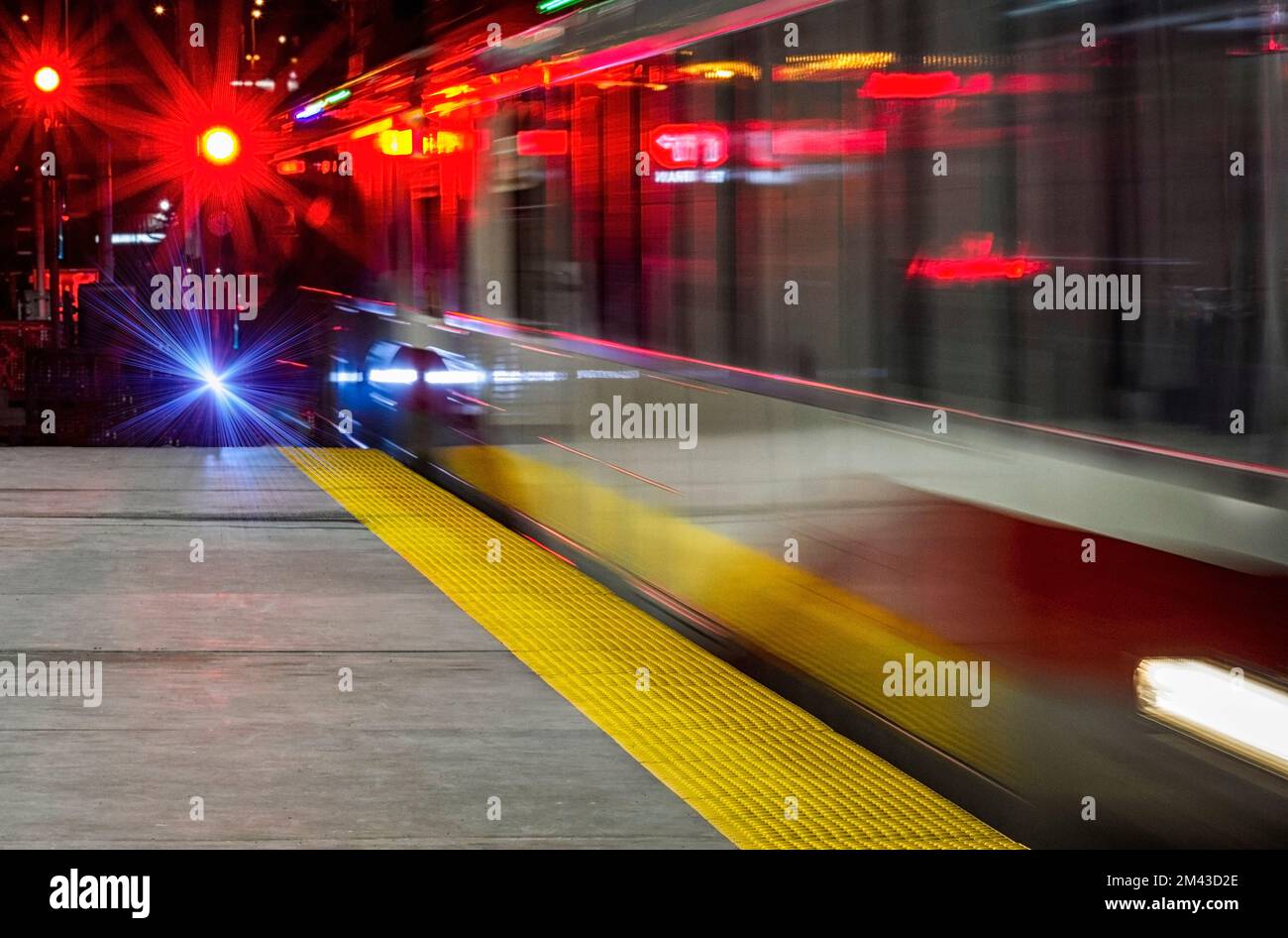Light Rail Transit (LRT) car pulling into station platform Stock Photo