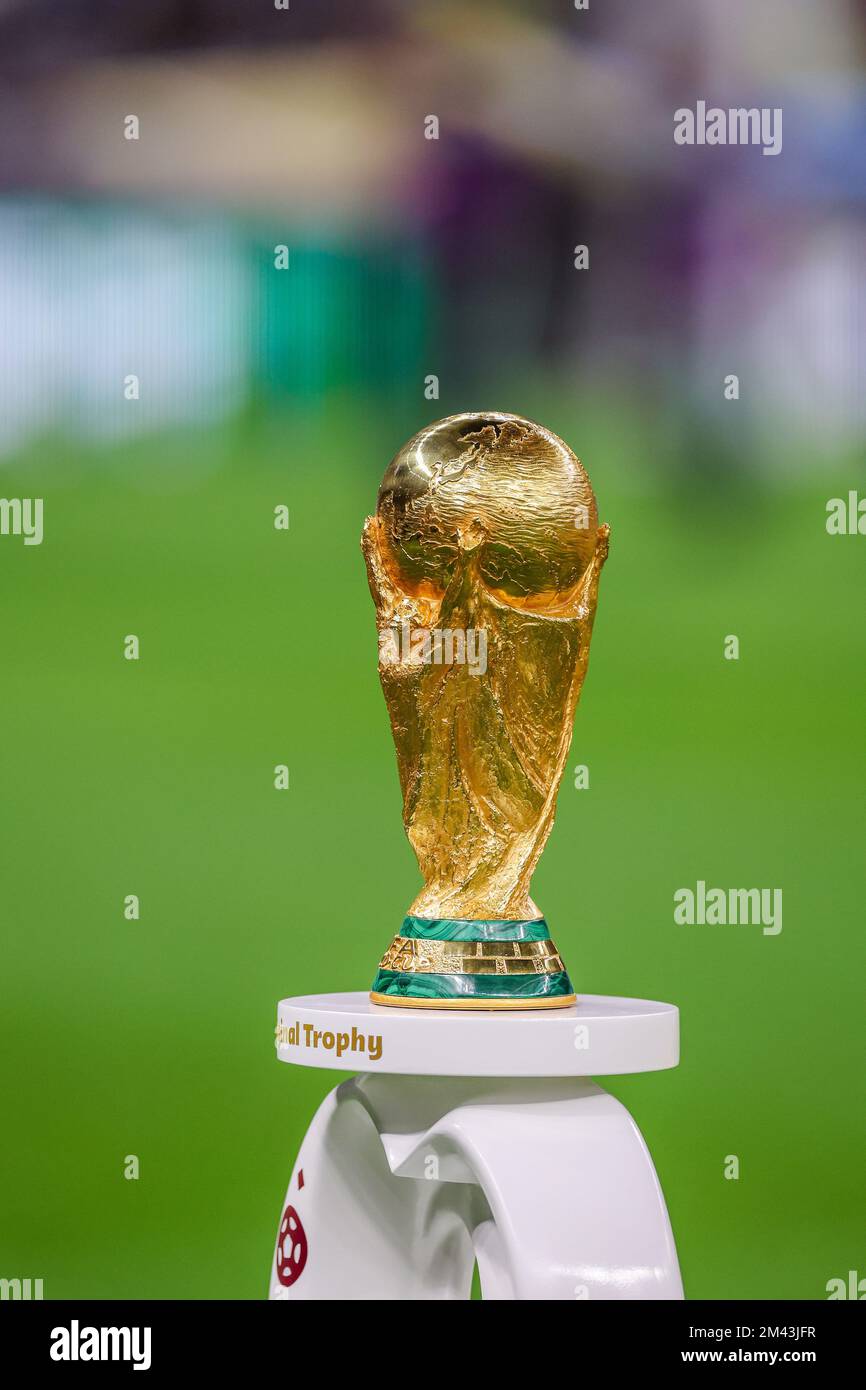 Doha, Qatar. 18th Dec, 2022. The FIFA World Cup Trophy is displayed on the pitch at the Qatar 2022 World Cup Final between Argentina and France at Lusail Stadium in Lusail, north of Doha, on December 18, 2022. (Photo: William Volcov) Credit: Brazil Photo Press/Alamy Live News Stock Photo