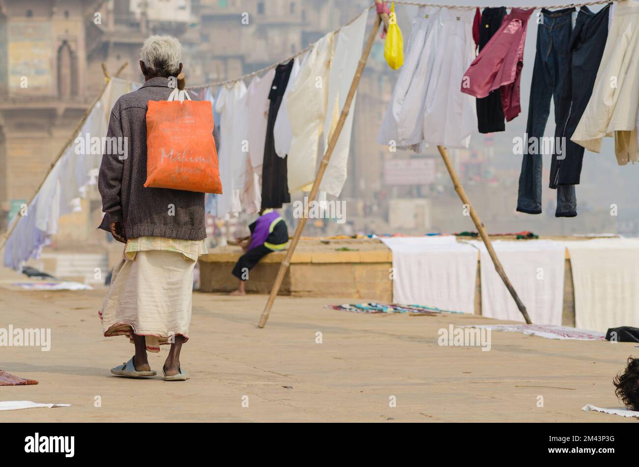 Man walking with bag hi-res stock photography and images - Alamy