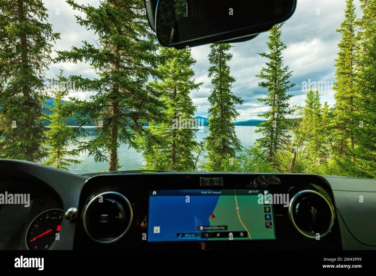 Driver's view of Dease Lake at sunset; Airstream Interstate 24X 4WD