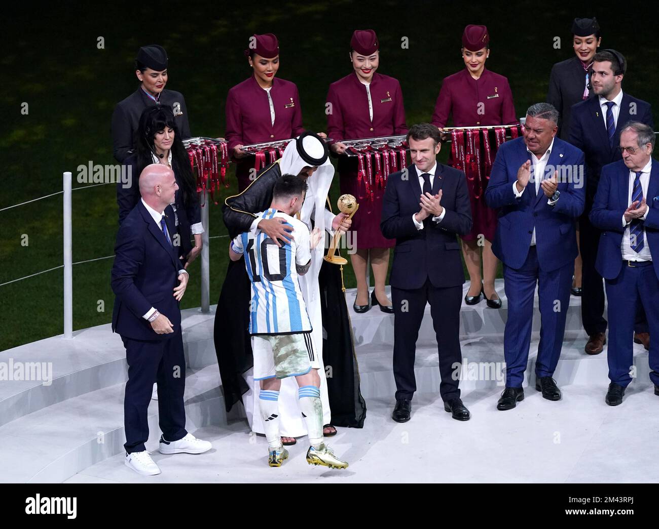 Argentina's Lionel Messi presented with the trophy for the Golden Ball ...