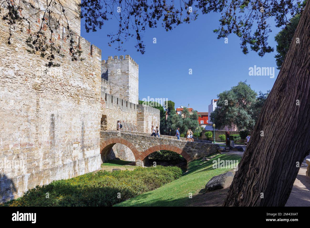 Lisbon, Portugal.  Entrance to the Castelo de Sao Jorge/the Castle of Saint George over the now dry moat. Stock Photo