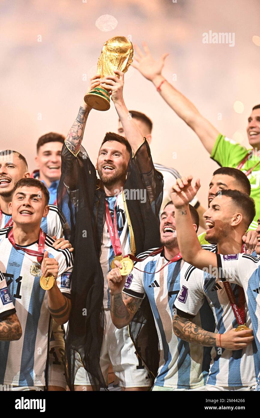 Lusail Iconic Stadium, Lusail, Qatar. 18th Dec, 2022. FIFA World Cup  Football Final Argentina versus France; Alexis Mac Allister of Argentina  lifts the world cup trophy Credit: Action Plus Sports/Alamy Live News