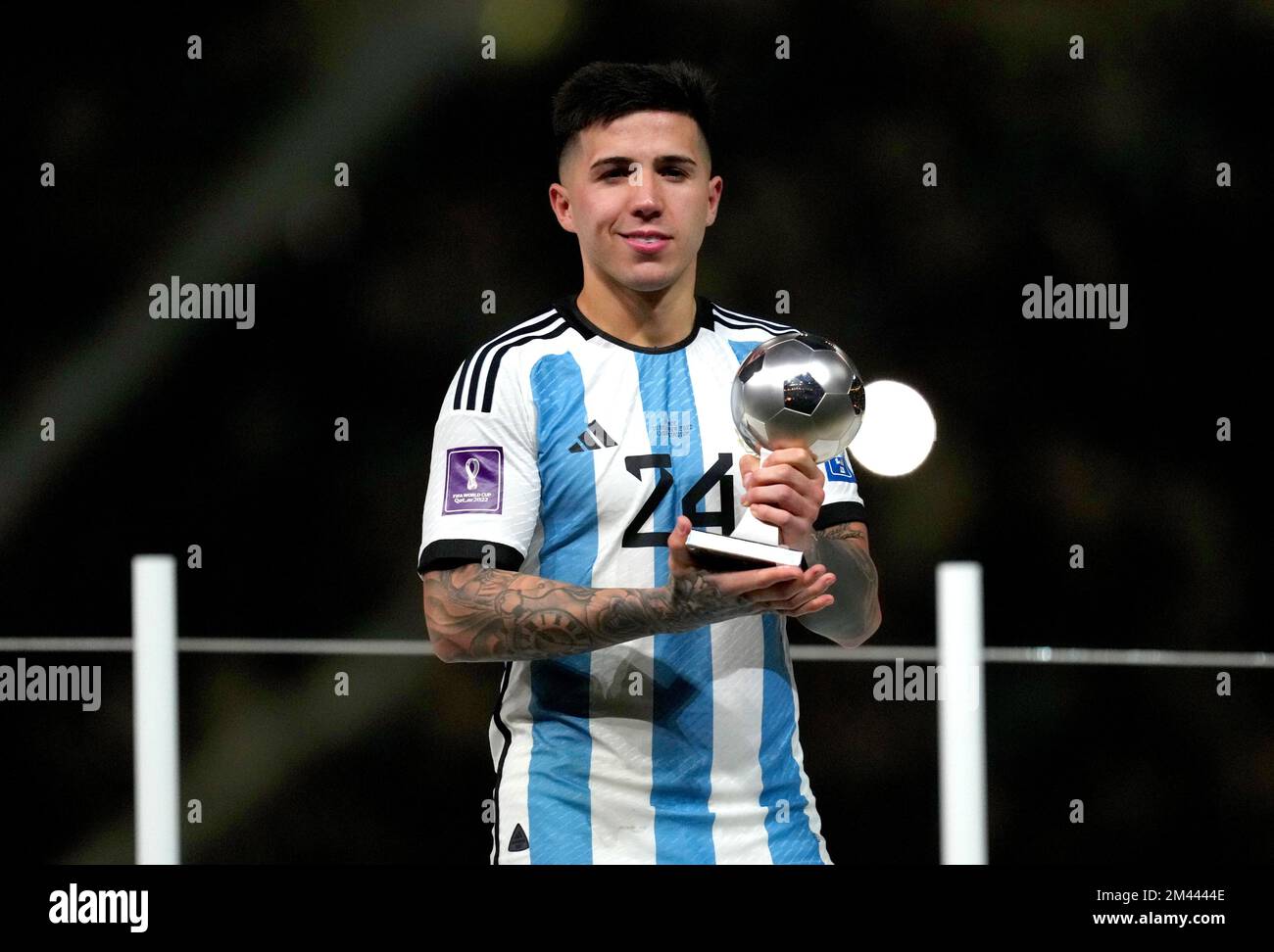 Argentina's Enzo Fernandez with the trophy for Young Player of the Tournament following victory in the FIFA World Cup final at Lusail Stadium, Qatar. Picture date: Sunday December 18, 2022. Stock Photo
