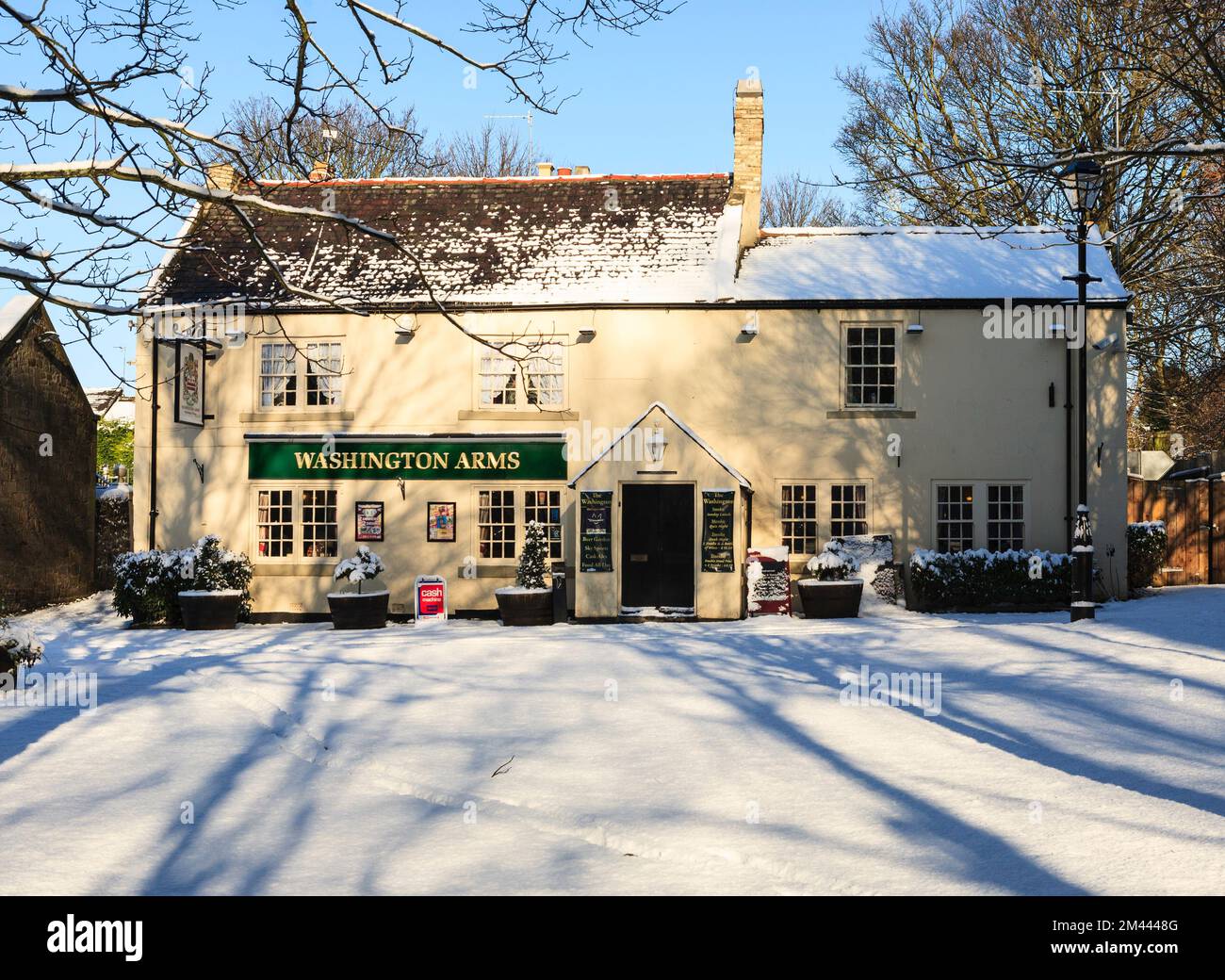 The Washington Arms public house located on The Green within Washington Village, seen in wintertime. Tyne and Wear, England, UK Stock Photo
