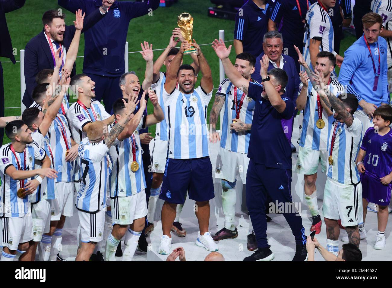 Lusail, Qatar. 18th Dec, 2022. Sergio Aguero of Argentina and team mates celebrate with the FIFA World Cup trophy to team mates during the Final of the FIFA World Cup Qatar 2022 between Argentina and France at Lusail Stadium, Lusail, Qatar on 18 December 2022. Photo by Peter Dovgan. Editorial use only, license required for commercial use. No use in betting, games or a single club/league/player publications. Credit: UK Sports Pics Ltd/Alamy Live News Stock Photo