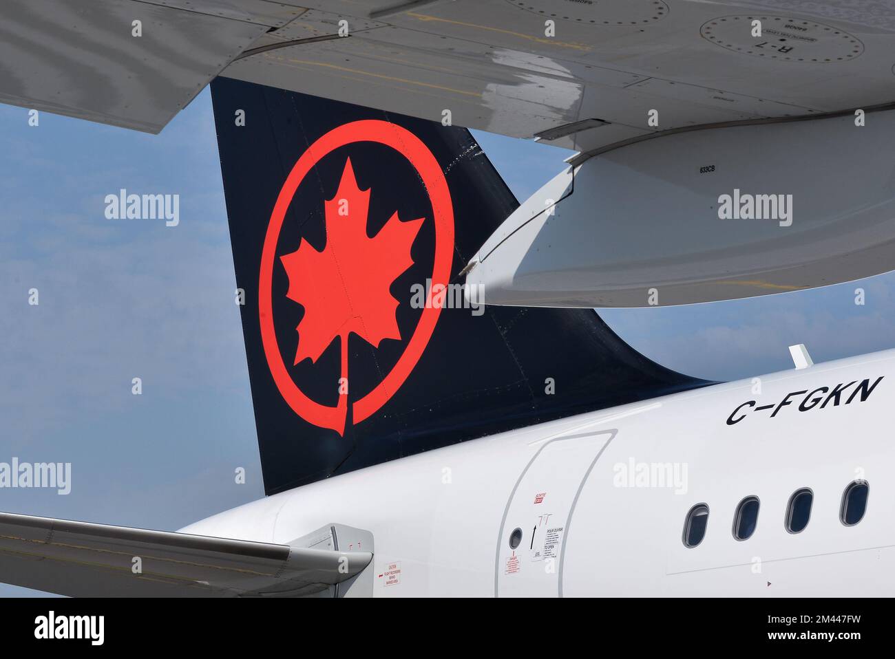 Toronto, ON, Canada – December 17, 2022: The sign of Air Canada. Air Canada is the flag carrier and the largest airline of Canada by the size and pass Stock Photo