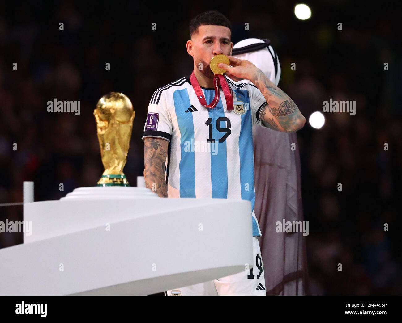 Doha, Qatar, 18th December 2022.  Nicolas Otamendi of Argentina kisses his winners medal during the FIFA World Cup 2022 match at Lusail Stadium, Doha. Picture credit should read: David Klein / Sportimage Stock Photo