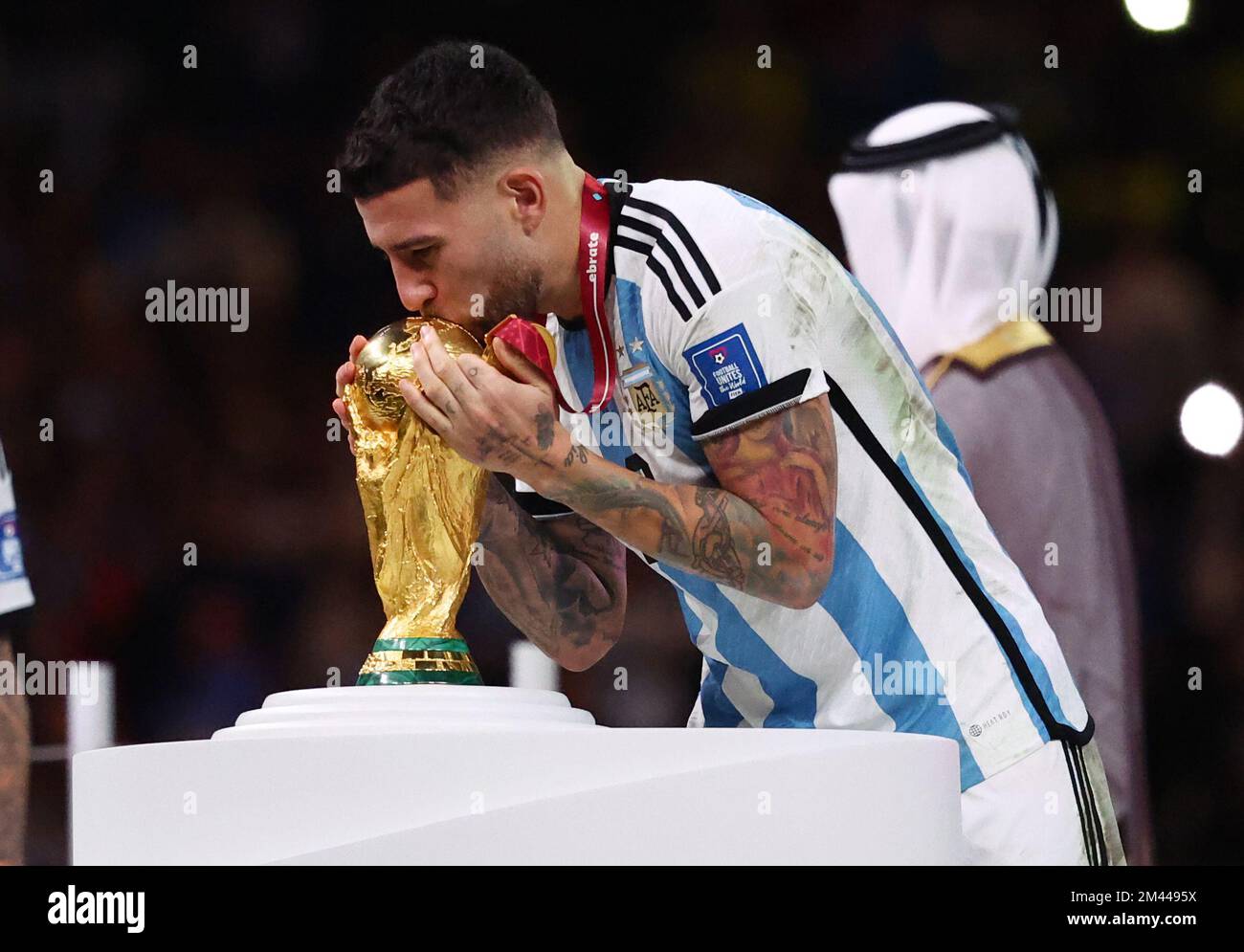 Doha, Qatar, 18th December 2022.  Nicolas Otamendi of Argentina kisses the World Cup during the FIFA World Cup 2022 match at Lusail Stadium, Doha. Picture credit should read: David Klein / Sportimage Stock Photo