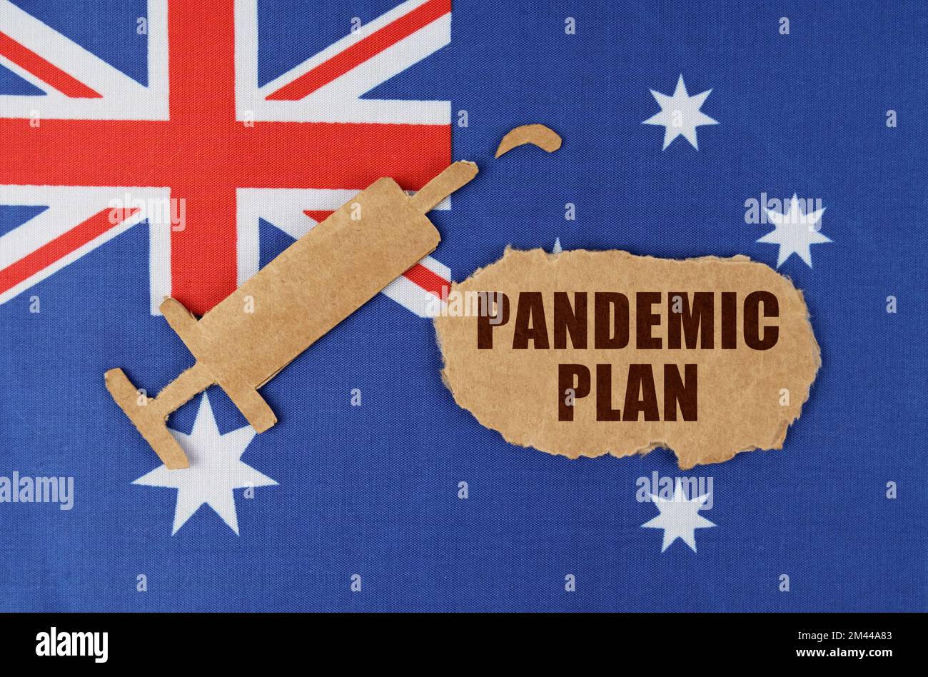Medical concept. On the flag of Australia there is a cardboard figure