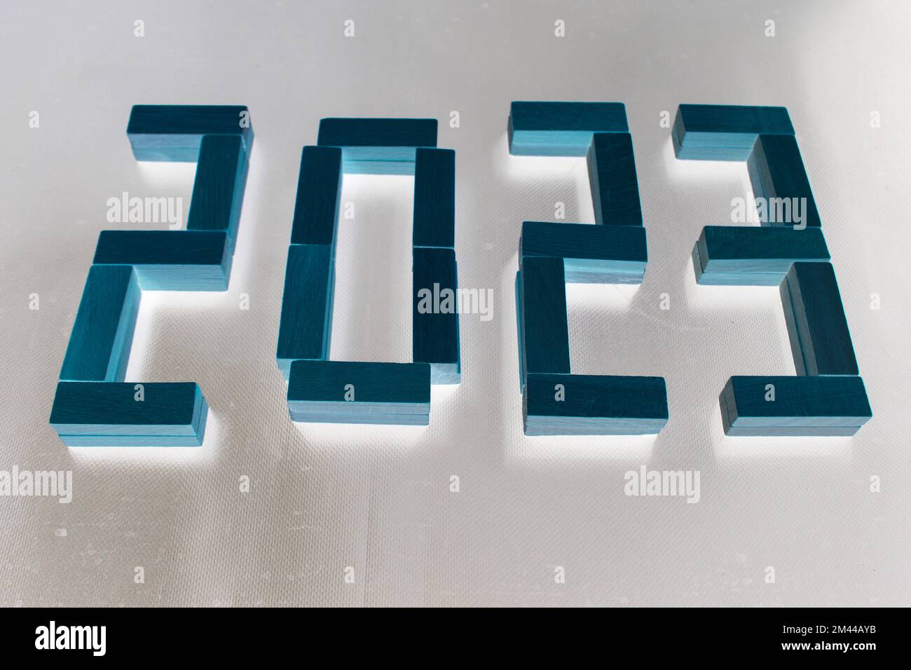 The number 2023 written in wooden blocks. Beginning and start of the new year 2023. Preparation for happy new year ,new life, new business, plan, goal Stock Photo