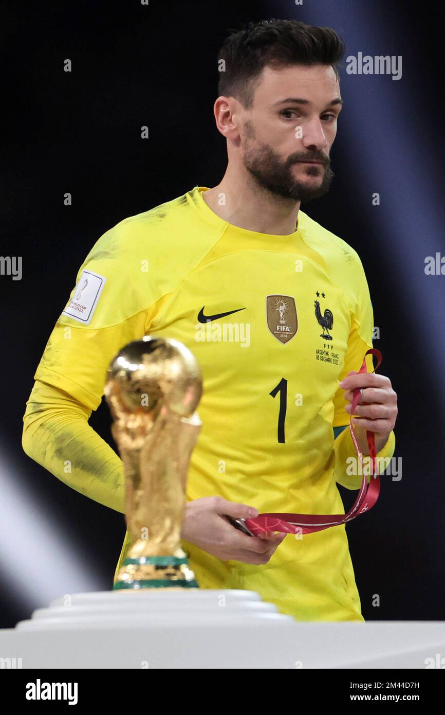 Lusail, Qatar. 18th Dec, 2022. Hugo Lloris, goalkeeper of France, looks at the World Cup Trophy during the awarding ceremony of the 2022 FIFA World Cup at Lusail Stadium in Lusail, Qatar, Dec. 18, 2022. Credit: Cao Can/Xinhua/Alamy Live News Stock Photo