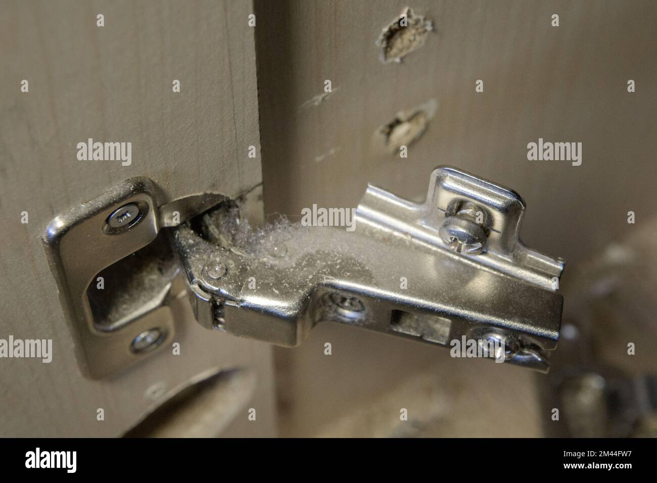 Tornout hinge of furniture fittings. hinge fixed on a modern